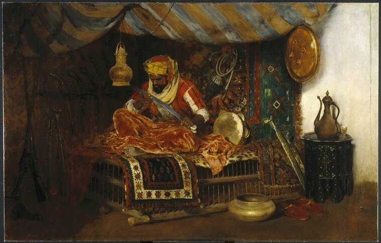 A Moor inspecting his sword.